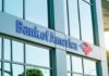 Bank of America branch exterior with logo on glass building